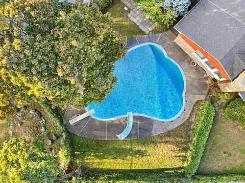 Aerial photo - 1909 Crois. Surrey, Mont-Royal, QC - Outdoor With In Ground Pool