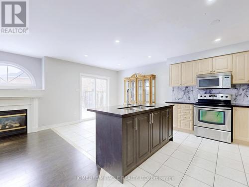 Mainfl - 77 Nobbs Drive, Ajax, ON - Indoor Photo Showing Kitchen With Fireplace