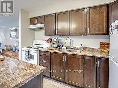 301 - 173 Eighth Street, Collingwood, ON - Indoor Photo Showing Kitchen With Double Sink