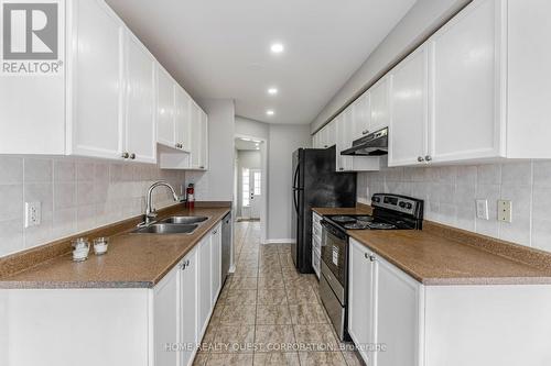 3398 Angel Pass Drive, Mississauga, ON - Indoor Photo Showing Kitchen With Double Sink