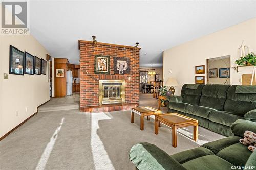 62 Calypso Drive, Moose Jaw, SK - Indoor Photo Showing Living Room With Fireplace