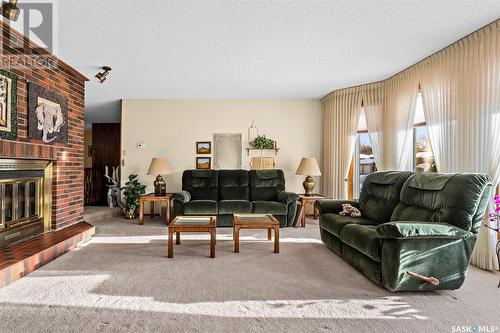 62 Calypso Drive, Moose Jaw, SK - Indoor Photo Showing Living Room With Fireplace