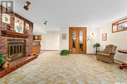 62 Calypso Drive, Moose Jaw, SK - Indoor Photo Showing Living Room With Fireplace