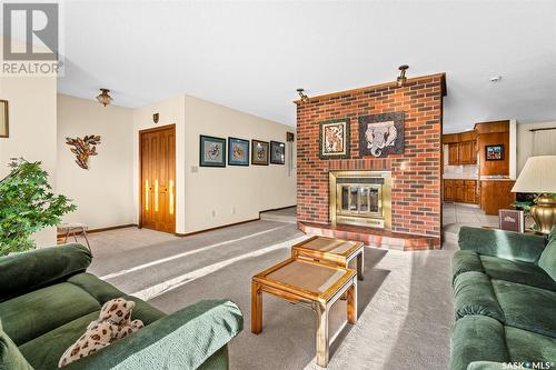 62 Calypso Drive, Moose Jaw, SK - Indoor Photo Showing Living Room With Fireplace