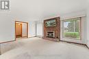 4033 Howard Avenue, Windsor, ON  - Indoor Photo Showing Living Room With Fireplace 