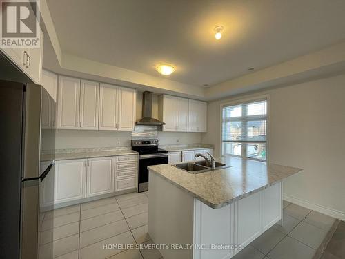 104 Deer Ridge Trail, Caledon, ON - Indoor Photo Showing Kitchen With Double Sink