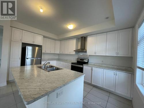 104 Deer Ridge Trail, Caledon, ON - Indoor Photo Showing Kitchen With Stainless Steel Kitchen With Double Sink