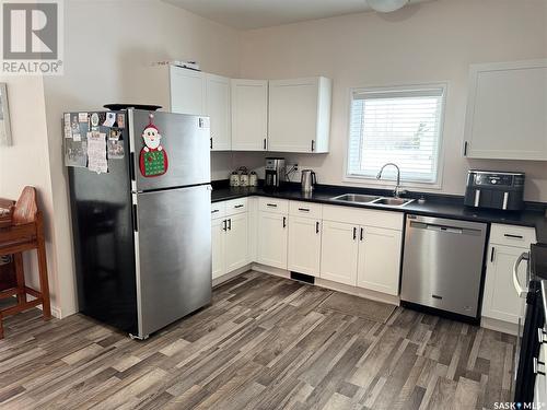 35 Mayo Street, Lanigan, SK - Indoor Photo Showing Kitchen With Stainless Steel Kitchen With Double Sink