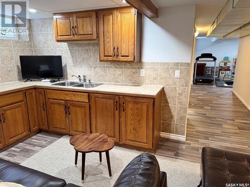 35 Mayo Street, Lanigan, SK - Indoor Photo Showing Kitchen With Double Sink