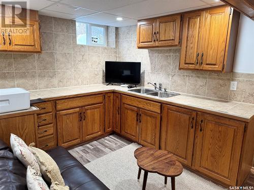 35 Mayo Street, Lanigan, SK - Indoor Photo Showing Kitchen With Double Sink