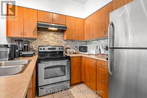 2104 - 185 Legion Road N, Toronto, ON - Indoor Photo Showing Kitchen With Double Sink