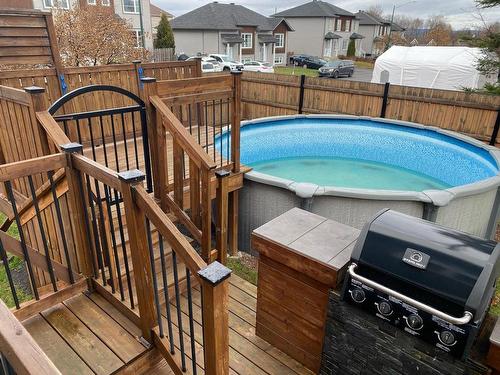 Exterior - 1068 Rue De L'Eldorado, Québec (La Haute-Saint-Charles), QC - Outdoor With Above Ground Pool With Exterior