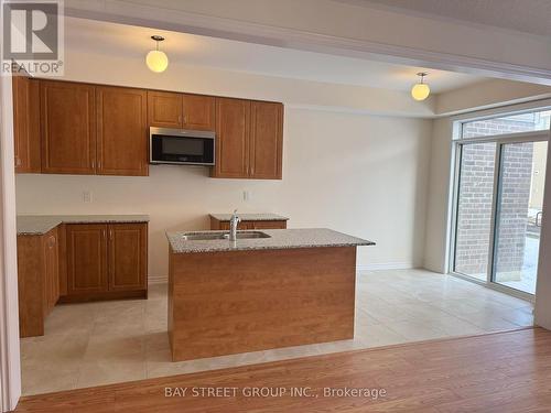 10 Prudhoe Terrace Terrace, Barrie, ON - Indoor Photo Showing Kitchen With Double Sink