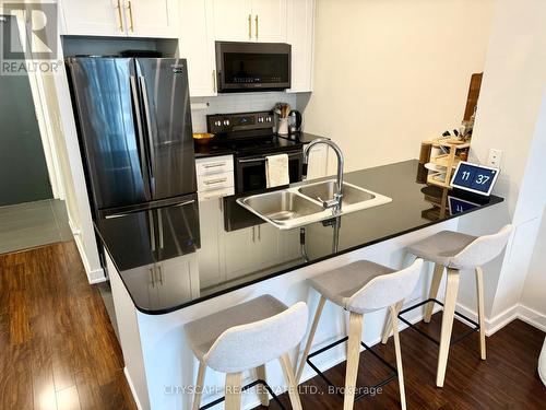 #3703 - 4070 Confederation Parkway, Mississauga, ON - Indoor Photo Showing Kitchen With Double Sink