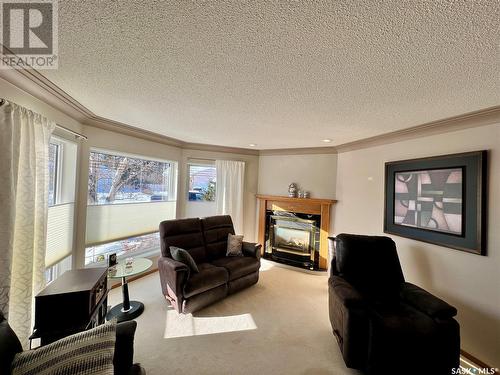 511 Stillwell Crescent, Swift Current, SK - Indoor Photo Showing Living Room With Fireplace