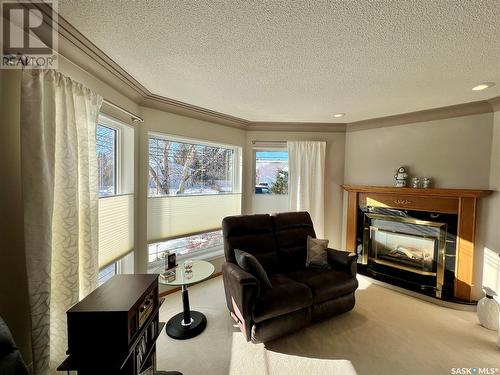 511 Stillwell Crescent, Swift Current, SK - Indoor Photo Showing Living Room With Fireplace