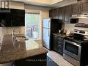 106 - 9589 Keele Street, Vaughan, ON  - Indoor Photo Showing Kitchen With Double Sink 