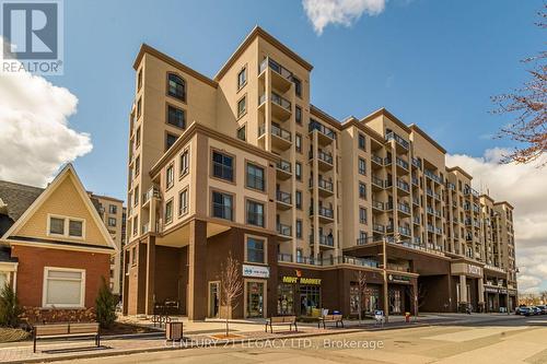 212 - 2486 Old Bronte Road, Oakville, ON - Outdoor With Facade