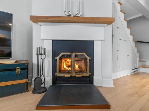 Living room - 81 Rg St-Claude, Saint-Philippe, QC - Indoor With Fireplace