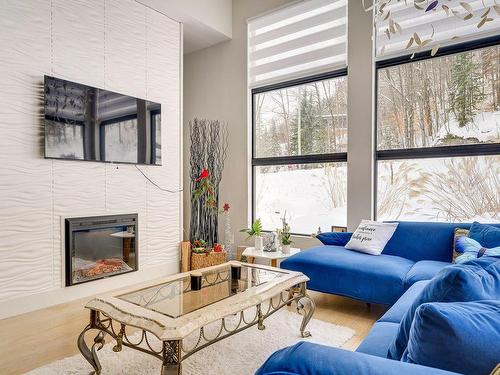 Living room - 4109 Rue De La Paroi, Sainte-Adèle, QC - Indoor Photo Showing Living Room With Fireplace