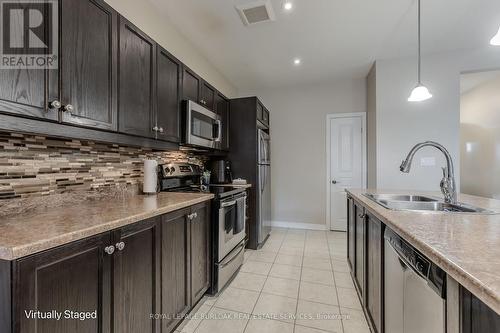 24 Manorwood Drive, West Lincoln, ON - Indoor Photo Showing Kitchen With Stainless Steel Kitchen With Double Sink