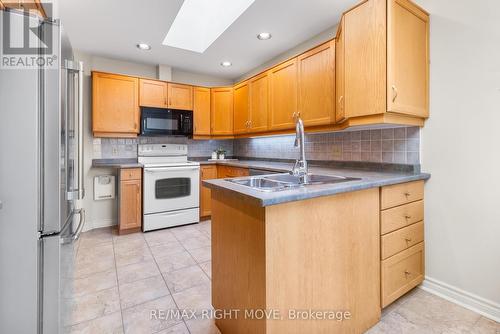 16 - 141 Welland Vale Road, St. Catharines, ON - Indoor Photo Showing Kitchen With Double Sink