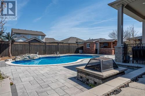 108 Paul Sloggett Court, Sarnia, ON - Outdoor With In Ground Pool