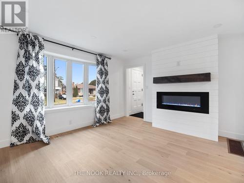 Upper - 590 Athol Street E, Oshawa (Central), ON - Indoor Photo Showing Living Room With Fireplace