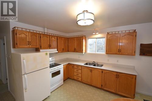 29-31 Cluneys Road, Conception Bay South, NL - Indoor Photo Showing Kitchen With Double Sink