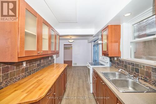 92 Carlton Street, St. Catharines (451 - Downtown), ON - Indoor Photo Showing Kitchen With Double Sink