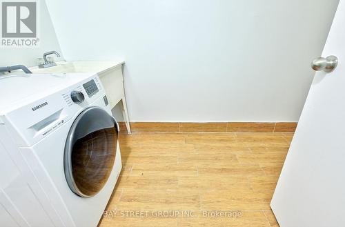 702 - 4091 Sheppard Avenue E, Toronto, ON - Indoor Photo Showing Laundry Room