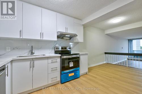 702 - 4091 Sheppard Avenue E, Toronto, ON - Indoor Photo Showing Kitchen