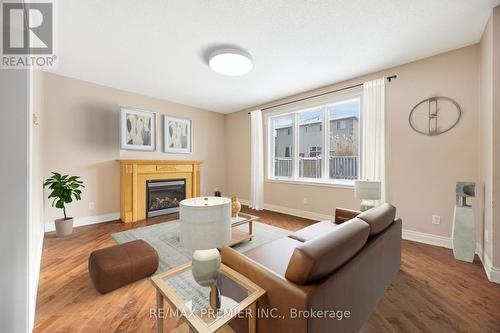 1215 Lowrie Street, Innisfil, ON - Indoor Photo Showing Living Room With Fireplace