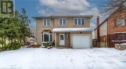 View of front of home featuring a garage - 21 Woodborough Place, Cambridge, ON - Outdoor With Facade