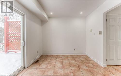 View of tiled spare room - 21 Woodborough Place, Cambridge, ON - Indoor Photo Showing Other Room