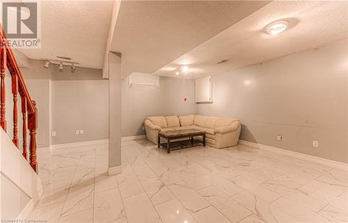 Basement with a textured ceiling - 21 Woodborough Place, Cambridge, ON - Indoor