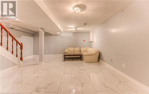 Unfurnished room featuring a textured ceiling - 21 Woodborough Place, Cambridge, ON - Indoor Photo Showing Other Room