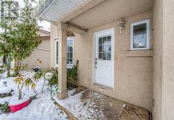 View of snow covered property entrance - 