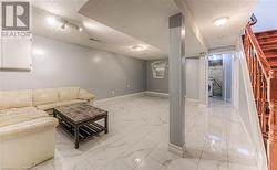 Unfurnished living room with a textured ceiling and washer / dryer - 