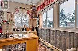 Home office with a paneled ceiling - 