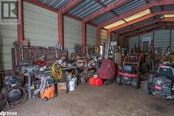 Garage featuring a workshop area - 