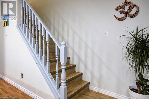 Staircase with hardwood / wood-style floors - 255 Lansdowne Avenue Unit# 3, Woodstock, ON - Indoor Photo Showing Other Room