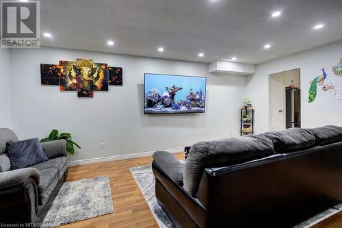 Living room with hardwood / wood-style floors - 255 Lansdowne Avenue Unit# 3, Woodstock, ON - Indoor