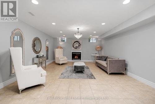 435 Country Club Drive, Windsor, ON - Indoor Photo Showing Living Room With Fireplace