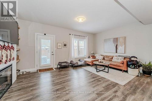 2 - 118 Simmonds Drive, Guelph (Waverley), ON - Indoor Photo Showing Living Room With Fireplace