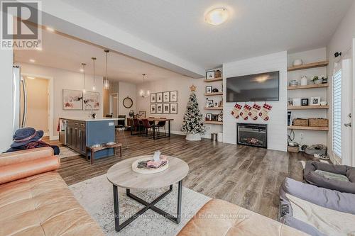 2 - 118 Simmonds Drive, Guelph (Waverley), ON - Indoor Photo Showing Living Room With Fireplace