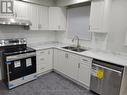 Upper - 133 Mill Street N, Brampton, ON  - Indoor Photo Showing Kitchen With Double Sink 