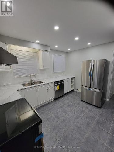 Upper - 133 Mill Street N, Brampton, ON - Indoor Photo Showing Kitchen With Double Sink