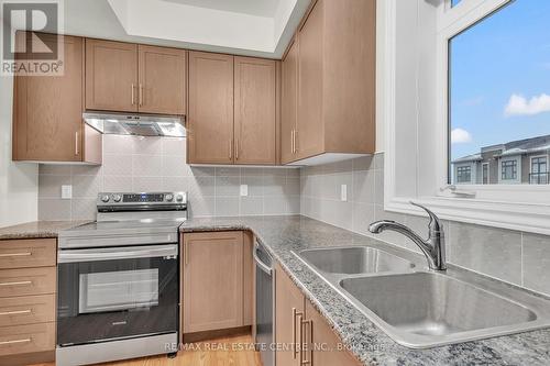 312 - 10 Halliford Place, Brampton, ON - Indoor Photo Showing Kitchen With Double Sink