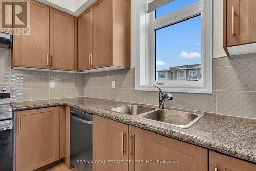 312 - 10 Halliford Place, Brampton, ON - Indoor Photo Showing Kitchen With Double Sink